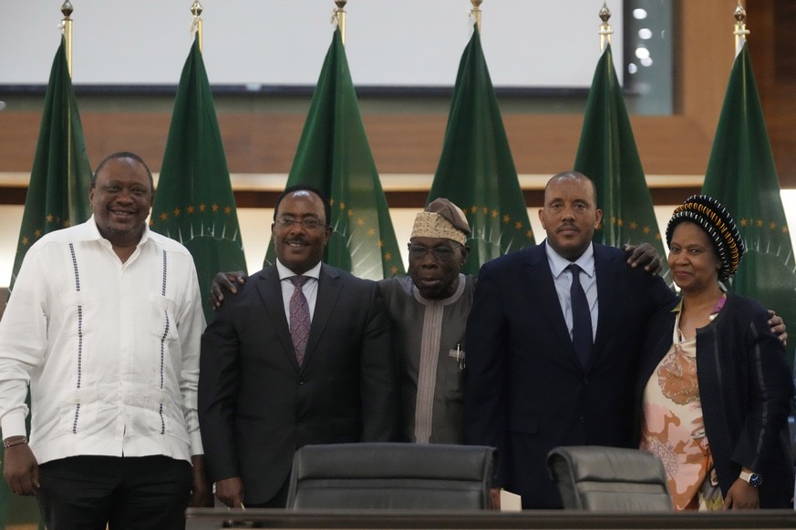 From left, Kenya&#039;s former president Uhuru Kenyatta, lead negotiator for Ethiopia&#039;s government, Redwan Hussein, African Union envoy Olusegun Obasanjo, lead Tigray negotiator Getachew Reda, an ...