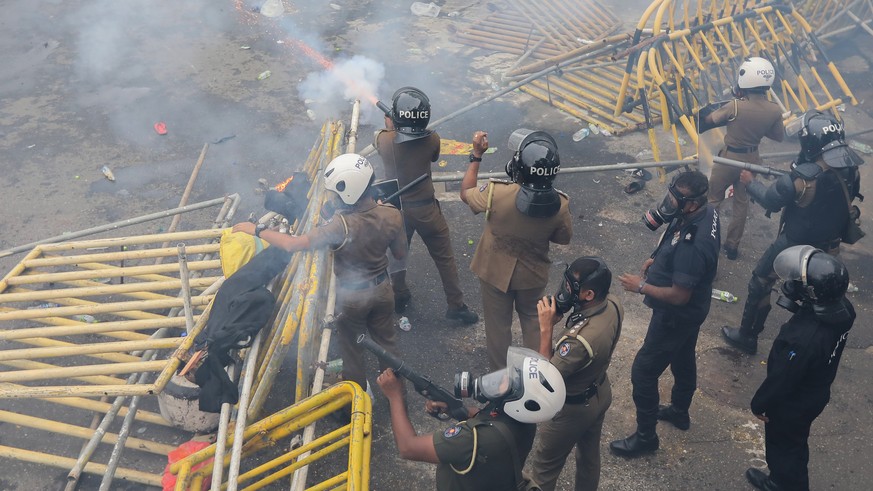 epa10004303 Security forces fire tear gas to disperse an anti government protest rally in Colombo, Sri Lanka, 09 June 2022. Protests have been rocking the country for over nearly two months, calling f ...