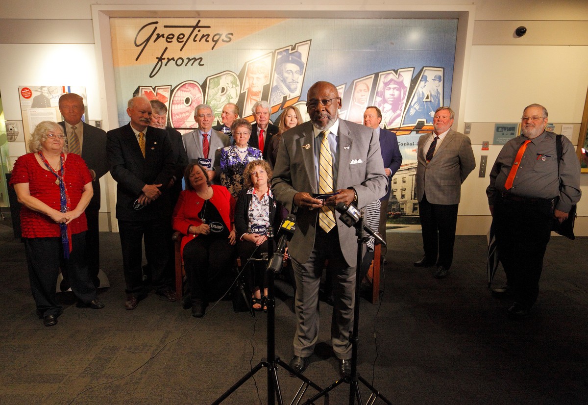 North Carolina's District 10 Elector Glenn Pinckney Sr. speaks to the media in front of his fellow state Electors before they rehearsed for tomorrow's electoral college vote in Raleigh, Nort ...