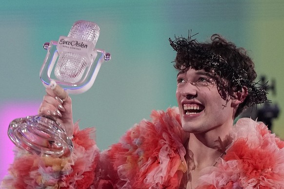 Nemo of Switzerland, who performed the song The Code, celebrates after winning the Grand Final of the Eurovision Song Contest in Malmo, Sweden, Saturday, May 11, 2024. (AP Photo/Martin Meissner)