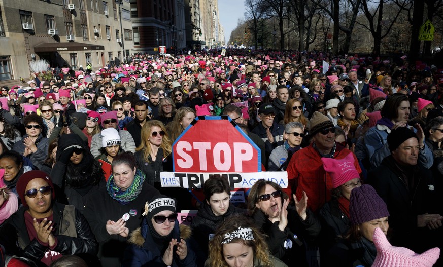 epa06458433 People gather for the Women&#039;s March in New York, New York, USA, 20 January 2018. The protest, which is taking place in cities around the country, is taking place a year after the firs ...