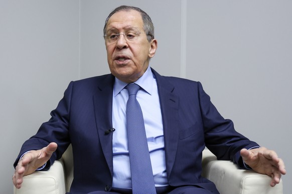 Russian Foreign Minister Sergey Lavrov gestures while speaking on the sidelines of the St. Petersburg International Economic Forum in St. Petersburg, Russia, Thursday, June 16, 2022. (TASS Host Photo  ...