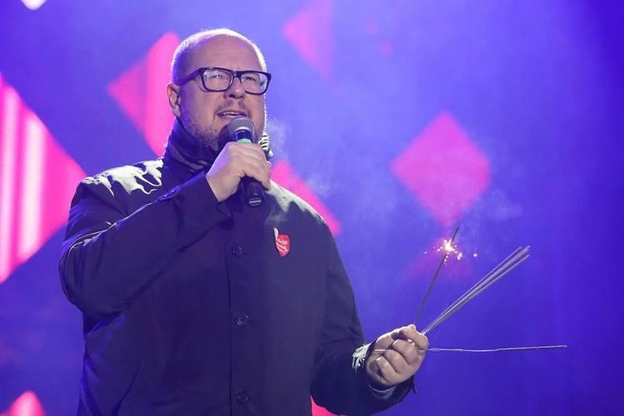 epa07282758 A handout photo made available by the City of Gdansk shows Mayor of Gdansk Pawel Adamowicz speaking during the 27th finale of the Great Orchestra of Christmas Charity in Gdansk, Poland, 13 ...