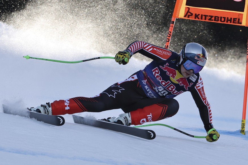 Canada&#039;s James Crawford speeds down the course during an alpine ski, men&#039;s World Cup downhill, in Kitzb�hel, Austria, Saturday, Jan. 25, 2025. (AP Photo/Marco Trovati)
