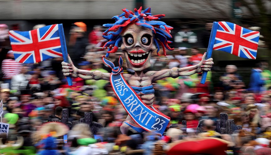 epa10480064 A carnival float titled &#039;Great Britain and the Brexit - not a model for success&#039; parades during the annual Rose Monday (Rosenmontag) parade in Duesseldorf, Germany, 20 February 2 ...