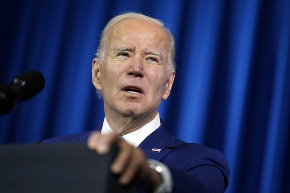 FILE - President Joe Biden speaks at the White House Conservation in Action Summit at the Department of the Interior, March 21, 2023, in Washington. Approval of Biden has dipped slightly since a month ...