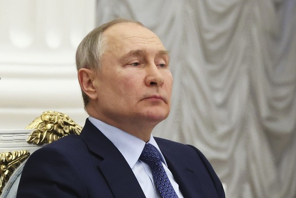Russian President Vladimir Putin attends a meeting with members of the Business Russia organization at the Kremlin in Moscow, Russia, Friday, May 26, 2023. (Mikhail Klimentyev, Sputnik, Kremlin Pool P…