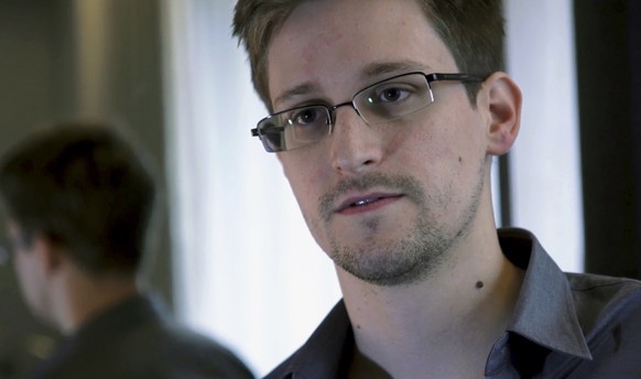 FILE - In this Sunday, June 9, 2013 file photo provided by The Guardian newspaper in London, shows Edward Snowden, who worked as a contract employee at the U.S. National Security Agency, in Hong Kong. ...