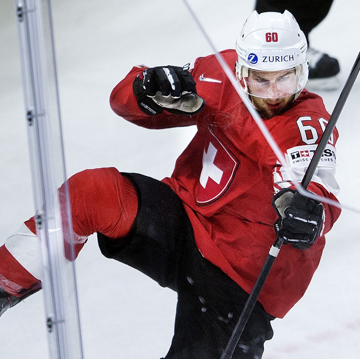Tristan Scherwey of Switzerland scores the first goal during the IIHF World Championship semi-final ice hockey match between Canada and Switzerland in Royal Arena in Copenhagen, Denmark, Saturday, May ...