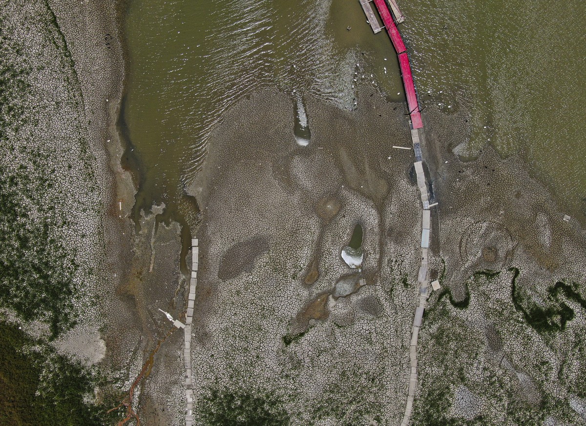 A view of The Boca reservoir that supplies water to the northern city of Monterrey is almost dry as the northern part of Mexico is affected by an intense drought, in Santiago, Mexico, Saturday, July 9 ...
