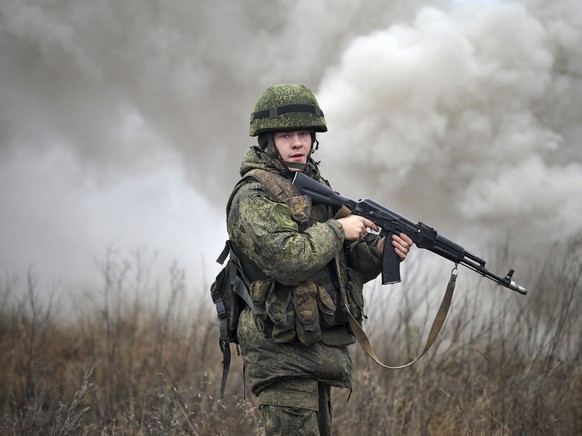 A Russian army soldier takes part in drills at the Kadamovskiy firing range in the Rostov region in southern Russia, Friday, Dec. 10, 2021. Russian troop concentration near Ukraine has raised Ukrainia ...
