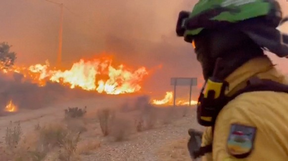 This image made from video provided by INFOCA shows firefighters battling a wildfire near Los Gallardos, Almeria, Spain, on Thursday, July 9, 2026. (INFOCA via AP)
Spain Wildfire
