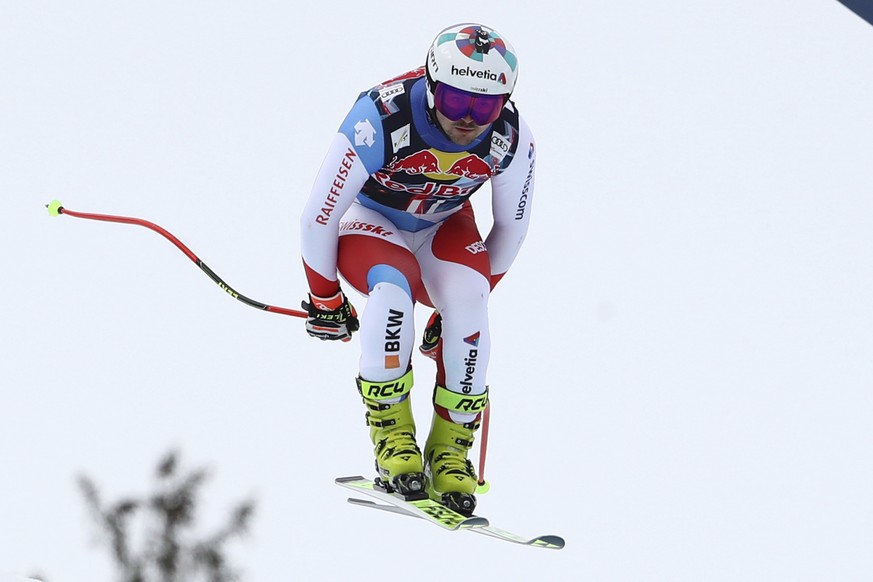 Switzerland&#039;s Urs Kryenbuehl speeds down the course during training for an alpine ski, men&#039;s World Cup downhill in Kitzb�1?4hel, Austria, Thursday, Jan. 21, 2021. (AP Photo/Marco Trovati)