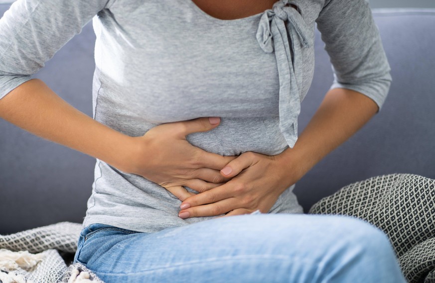 Woman With Stomach Ache Copyright: xAndreyPopovx Panthermedia27666811 ,model released, Symbolfoto