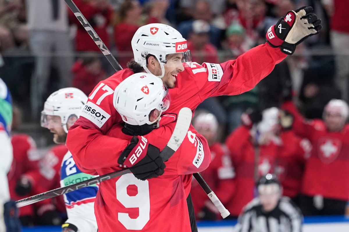 Switzerland's Jonas Siegenthaler (17) celebrates after scoring his side's third goal during the 2026 IIHF Men's Ice Hockey World Championship semifinal match between Switzerland and Nor ...