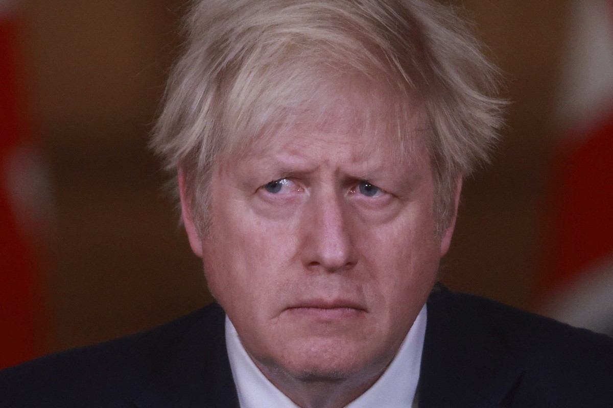 Britain's Prime Minister Boris Johnson speaks during a news conference in response to the ongoing situation with the coronavirus (COVID-19) pandemic, inside 10 Downing Street in London, Tuesday,  ...