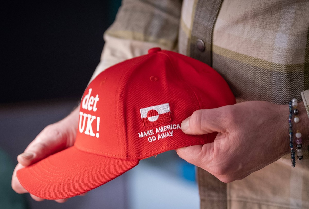COPENHAGEN 2026-01-15 Jesper Tonnesen, shop owner / cap designer, with his cap with the text Now it s Nuuk Make America go away at McKorman on Norrebrogade in Copenhagen in January 2026. The caps have ...