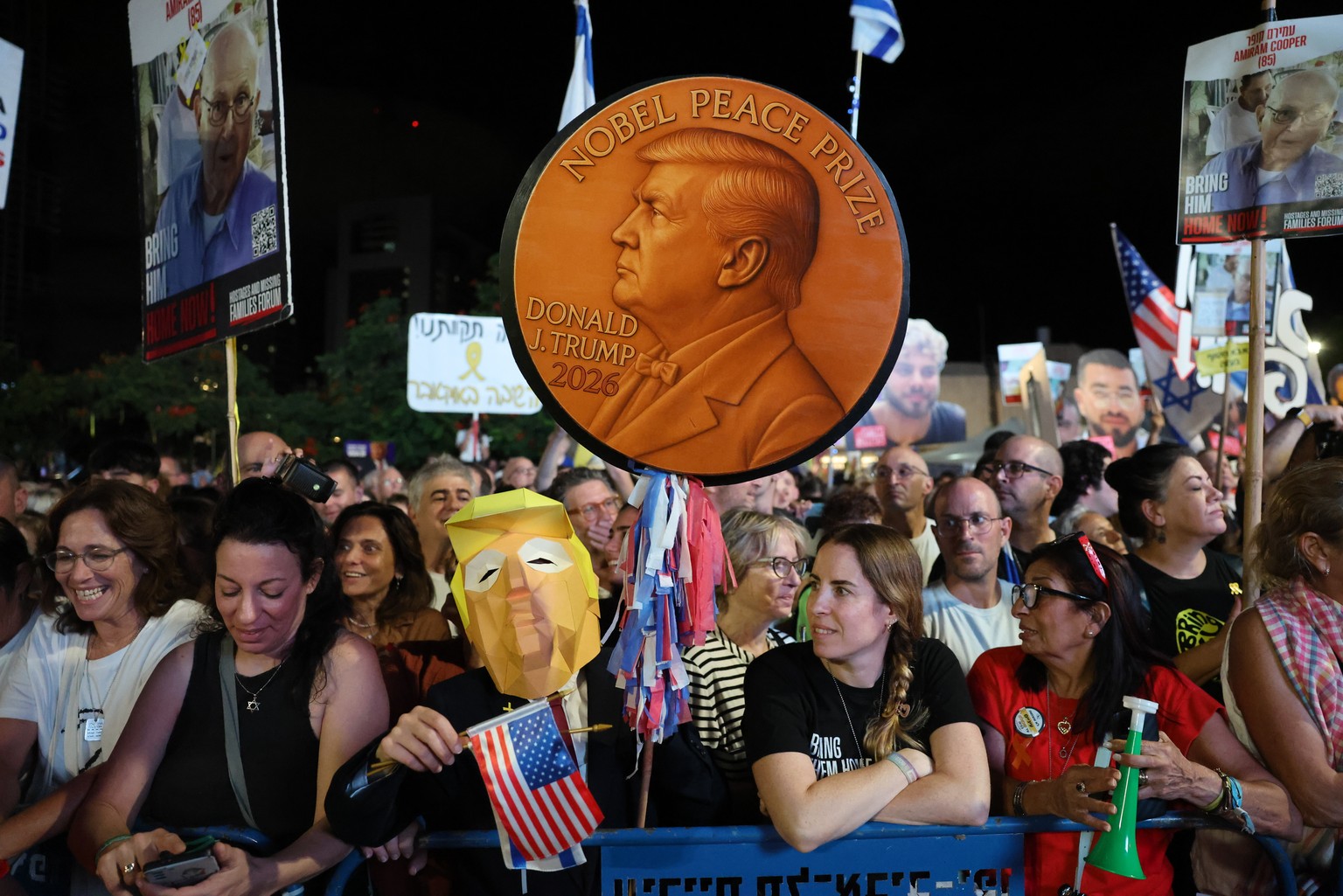 epa12447403 People celebrate during a rally at the so-called &#039;Hostages Square&#039; outside the Kirya military headquarters in Tel Aviv, Israel, 11 October 2025. Tens of thousands are to gather a ...