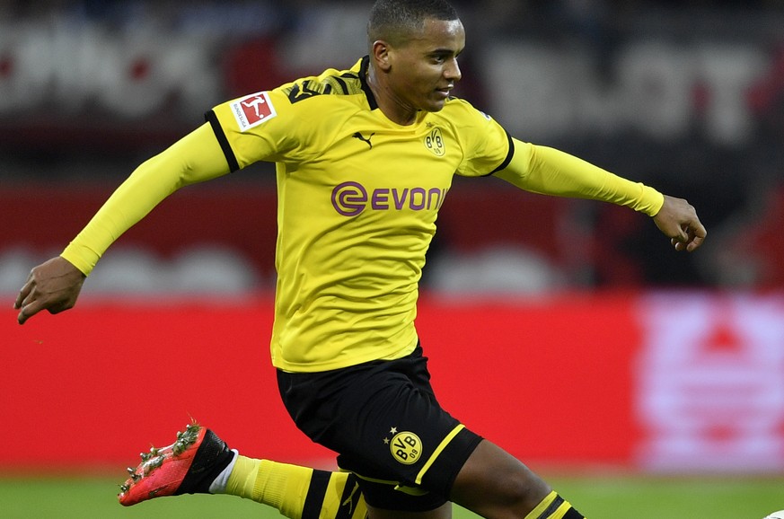 Dortmund&#039;s Manuel Akanji controls the ball during the German Bundesliga soccer match between Bayer Leverkusen and Borussia Dortmund in Leverkusen, Germany, Saturday, Feb. 8, 2020. (AP Photo/Marti ...