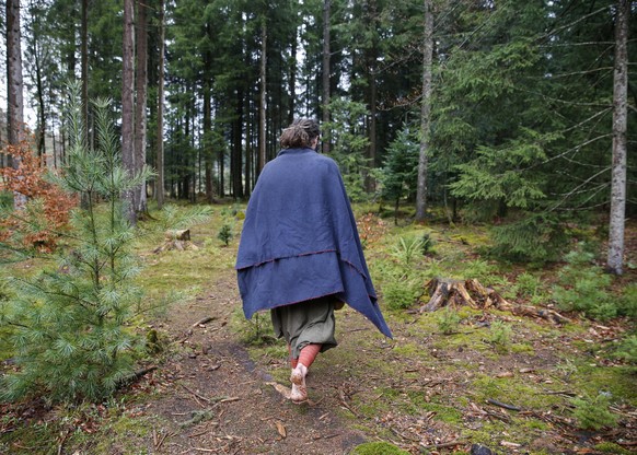 [Editor&#039;s Note: image may only be used in an editorial context with the Bremgarten forest settlers] Settler Withold walks through Bremgarten forest in Bern, Switzerland, on April 13, 2015. A grou ...