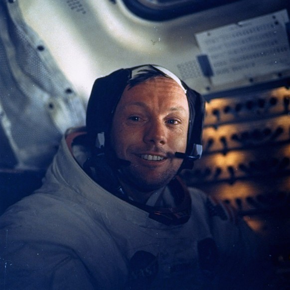 FILE - In this July 20, 1969 file photo provided by NASA, astronaut Neil A. Armstrong, Apollo 11 commander, smiles for a photo inside the Lunar Module while it rested on the lunar surface. Armstrong w ...