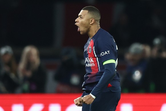 epa11000201 Kylian Mbappe of PSG celebrates after scoring the 1-1 goal from the penalty spot during the UEFA Champions League group F match between Paris Saint-Germain and Newcastle United in Paris, F ...