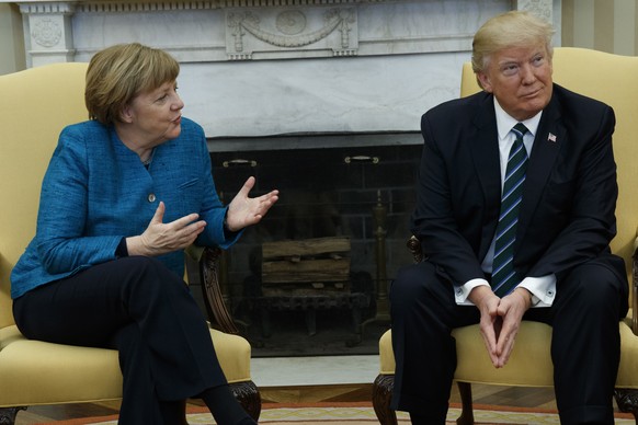 President Donald Trump meets with German Chancellor Angela Merkel in the Oval Office of the White House in Washington, Friday, March 17, 2017. (AP Photo/Evan Vucci)