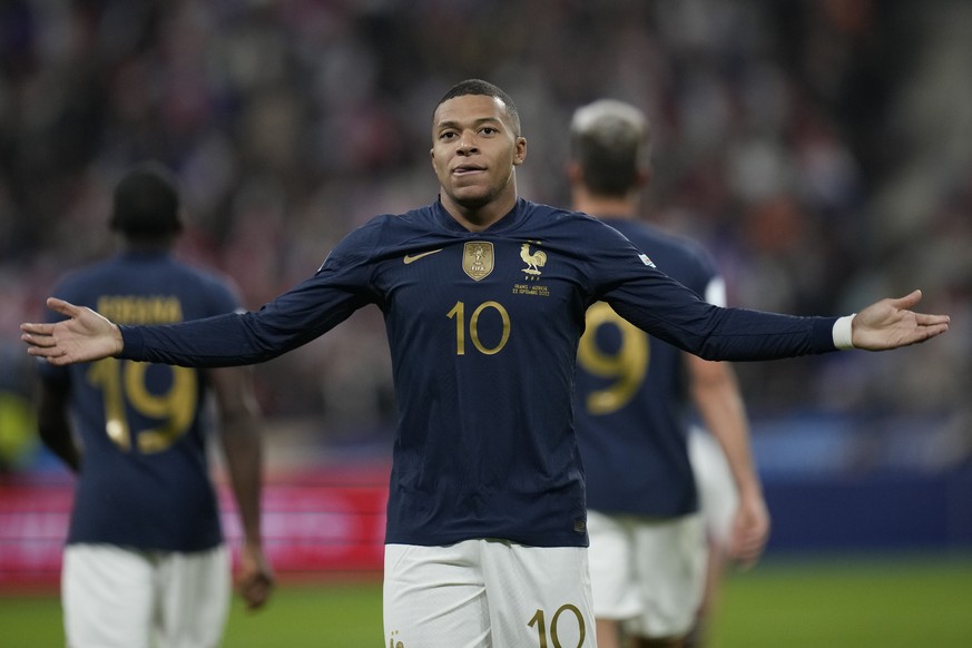 France's Kylian Mbappe celebrates scoring his side's first goal during the UEFA Nations League soccer match between France and Austria at the Stade de France stadium in Saint Denis, outside Paris, Fra ...
