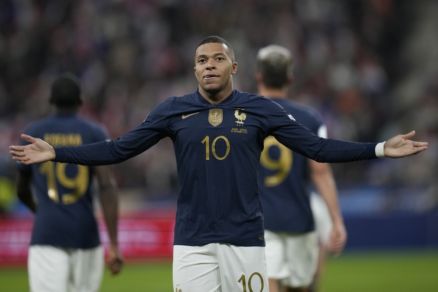 France&#039;s Kylian Mbappe celebrates scoring his side&#039;s first goal during the UEFA Nations League soccer match between France and Austria at the Stade de France stadium in Saint Denis, outside  ...