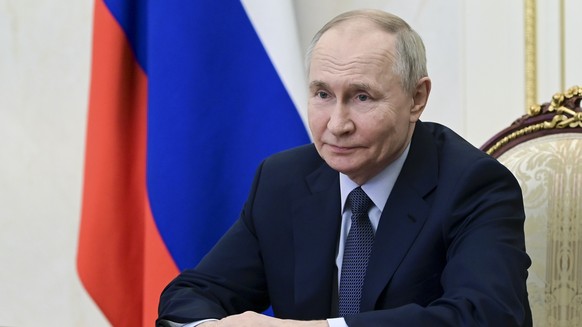 Russian President Vladimir Putin chairs a Security Council meeting via videoconference at the Kremlin in Moscow, Russia, Friday, Feb. 7, 2025. (Pavel Byrkin, Sputnik, Kremlin Pool Photo via AP)