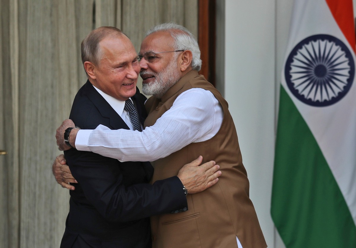 FILE - Indian Prime Minister Narendra Modi, right, hugs Russian President Vladimir Putin before their meeting in New Delhi, India, on Oct. 5, 2018. (AP Photo/Manish Swarup, File)
Narendra Modi,Vladimi ...