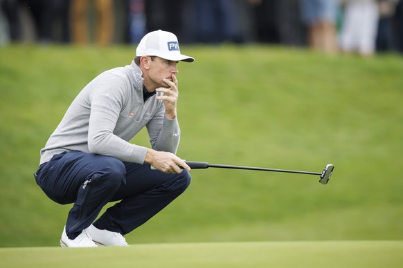 Joel Girrbach from Switzerland lines up his putt during the first round of the DP World Tour Omega European Masters Golf Tournament, in Crans-Montana, Switzerland, Thursday, August 28, 2025. (KEYSTONE ...
