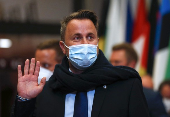 FILE - In this Friday, June 25, 2021 file photo, Luxembourg&#039;s Prime Minister Xavier Bettel leaves at the end of the first day of an EU summit in Brussels. Luxembourg Prime Minister Xavier Bettel  ...