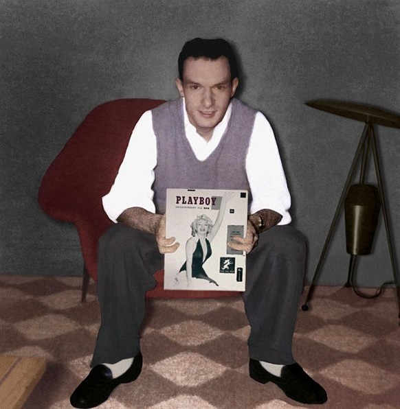 This Decmber, 1953 handout photo shows Playboy Magazine founder Hugh Hefner holding the first issue of Playboy featuring actress Marilyn Monroe. Fifty years after Hefner launched Playboy and a sexual  ...