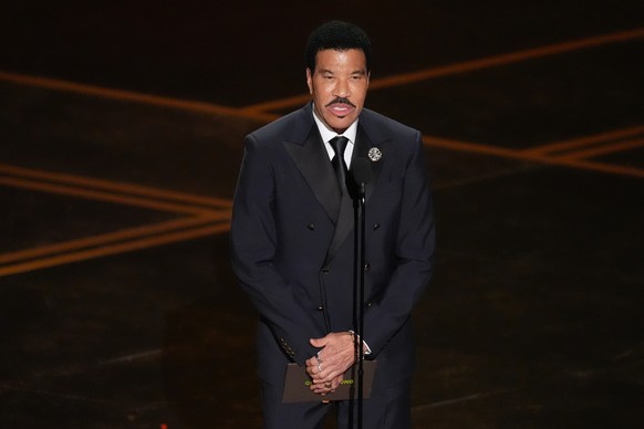 Lionel Richie presents the award for best original song during the Oscars on Sunday, March 15, 2026, at the Dolby Theatre in Los Angeles. (AP Photo/Chris Pizzello)
Lionel Richie