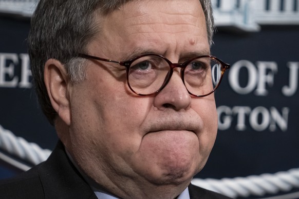 FILE - In this Jan. 13, 2020, file photo Attorney General William Barr speaks to reporters at the Justice Department in Washington to announce results of an investigation of the shootings at the Pensa ...