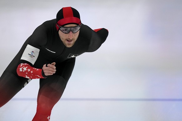 Livio Wenger of Switzerland competes during the men&#039;s speedskating 5,000-meter race at the 2022 Winter Olympics, Sunday, Feb. 6, 2022, in Beijing. (AP Photo/Ashley Landis)