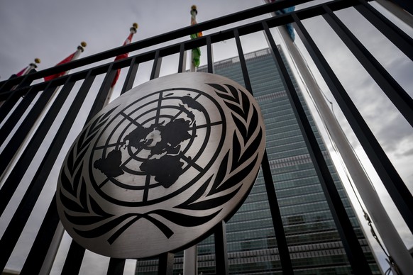 FILE - The United Nations symbol is displayed on the main gate outside the UN headquarters, February 24, 2022, in New York.  The United States is leading the way in the first United Nations resolution on art...