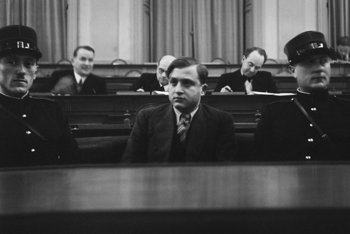 This image of December 10, 1936, shows Jewish student David Frankfurter (middle) in the dock during his trial in Chur in the canton of Grisons, Switzerland. David Frankfurter shot down Nazi official W ...