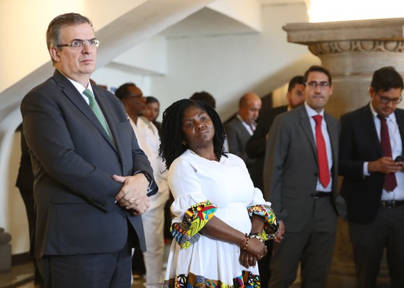 epa10514390 Colombian Vice President Francia Marquez (2-L) and Mexican Foreign Minister Marcelo Ebrard (L) speak to the press at the end of the second phase of the Peace Talks Table between the Colomb ...