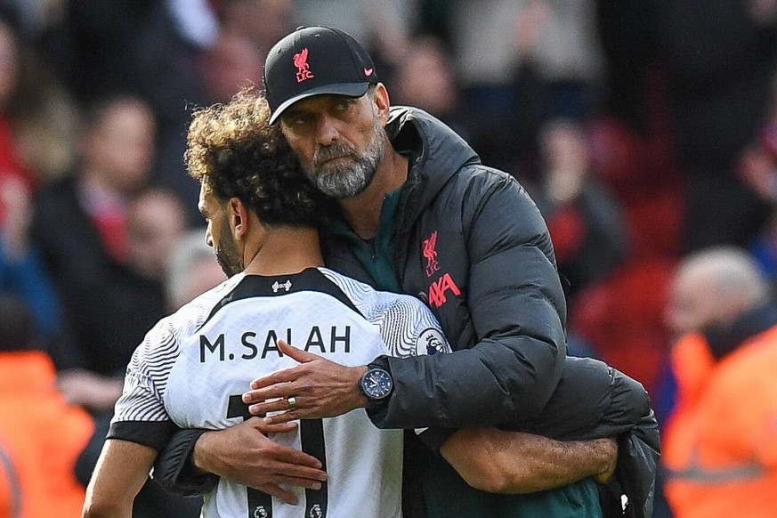 October 22, 2022, Nottingham, Nottinghamshire, United Kingdom: Jrgen Klopp manager of Liverpool consoles Mohamed Salah 11 of Liverpool at the end of the game during the Premier League match Nottingham ...