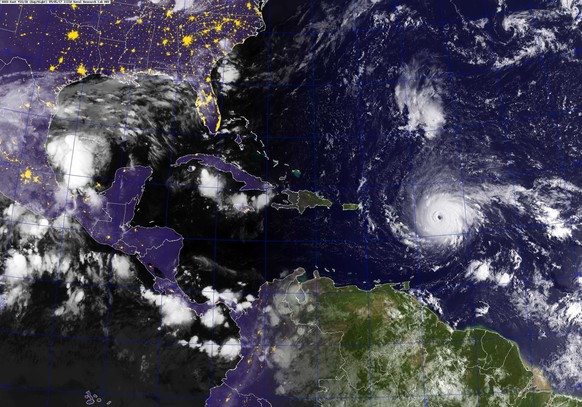 epa06187234 A handout photo made available by the US Navy on 06 September 2017 shows a GOES-East satellite image of Hurricane Irma as it strengthened to a Category 5 hurricane in the Central Atlantic  ...