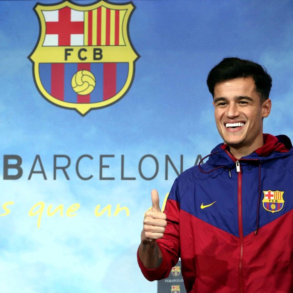 epa06423340 Brazilian midfielder Philippe Coutinho reacts upon his arrival at FC Barcelona, one the eve of his presentation as new Barca player in Barcelona, Spain, 07 January 2018. EPA/Toni Albir