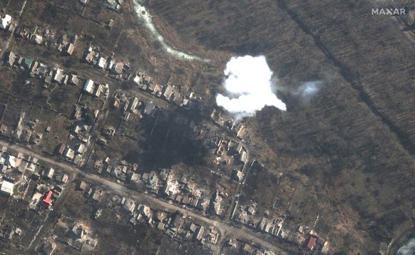 This satellite image provided by Maxar Technologies shows smoke from recently dropped ordnance in southern Bakhmut, Ukraine, Monday March 6, 2023. (Satellite image �2023 Maxar Technologies via AP)