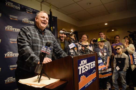 Sen. Jon Tester surrounded by family and supporters, announces his victory Wednesday, Nov. 7, 2018 in Great Falls, Mont. Tester has won a third term in the U.S. Senate by beating Republican Matt Rosen ...