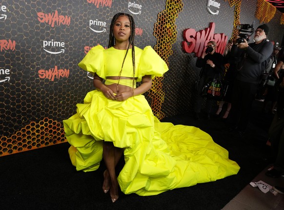 Dominique Fishback, a cast member in "Swarm," poses at the premiere of the Amazon Prime Video series, Tuesday, March 14, 2023, at Lighthouse ArtSpace in Los Angeles. (AP Photo/Chris Pizzello ...
