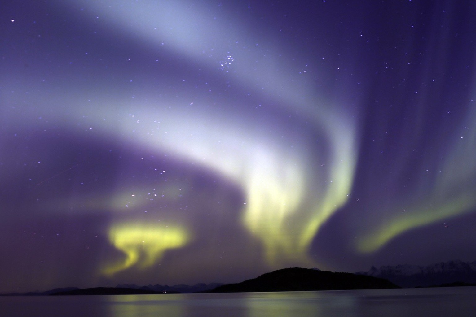 The aurora borealis, or Northern Lights, are seen over the Norwegian town of Harstad, Wednesday, Oct. 7, 2015.(AP Photo/Gregorio Borgia)