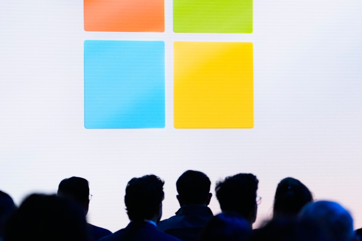 FILE - People attend a showcase event of the company's AI assistant, Copilot, ahead of the annual Build developer conference at Microsoft headquarters, Monday, May 20, 2024, in Redmond, Wash. (AP ...