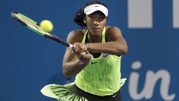 epa05694917 Destanee Aiava of Australia in action against Bethanie Mattek-Sands of United States during their first round match at the Brisbane International Tennis Tournament in Brisbane, Australia,  ...