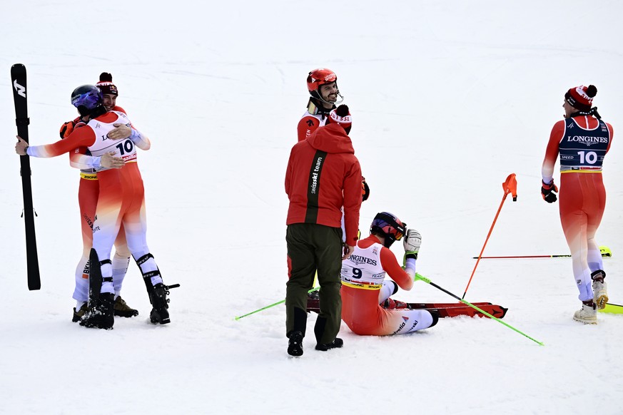 Marc Rochat of Switzerland, left, Franjo von Allmen of Switzerland, 2nd left, Loic Meillard of Switzerland, centre, Tanguy Nef of Switzerland, 2nd right, and Stefan Rogentin of Switzerland, right, cel ...